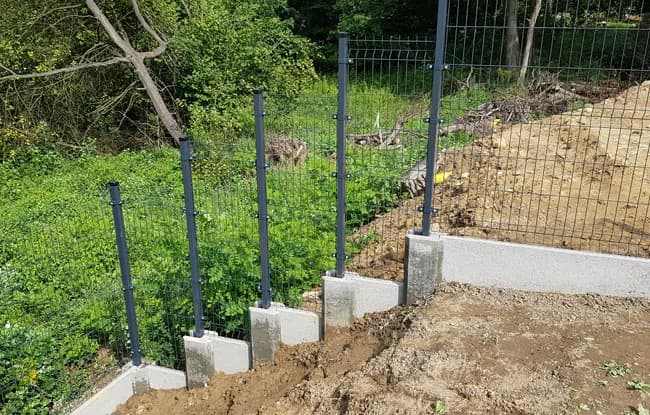 Jak podwyższyć ogrodzenie panelowe - proste sposoby na stabilność i estetykę